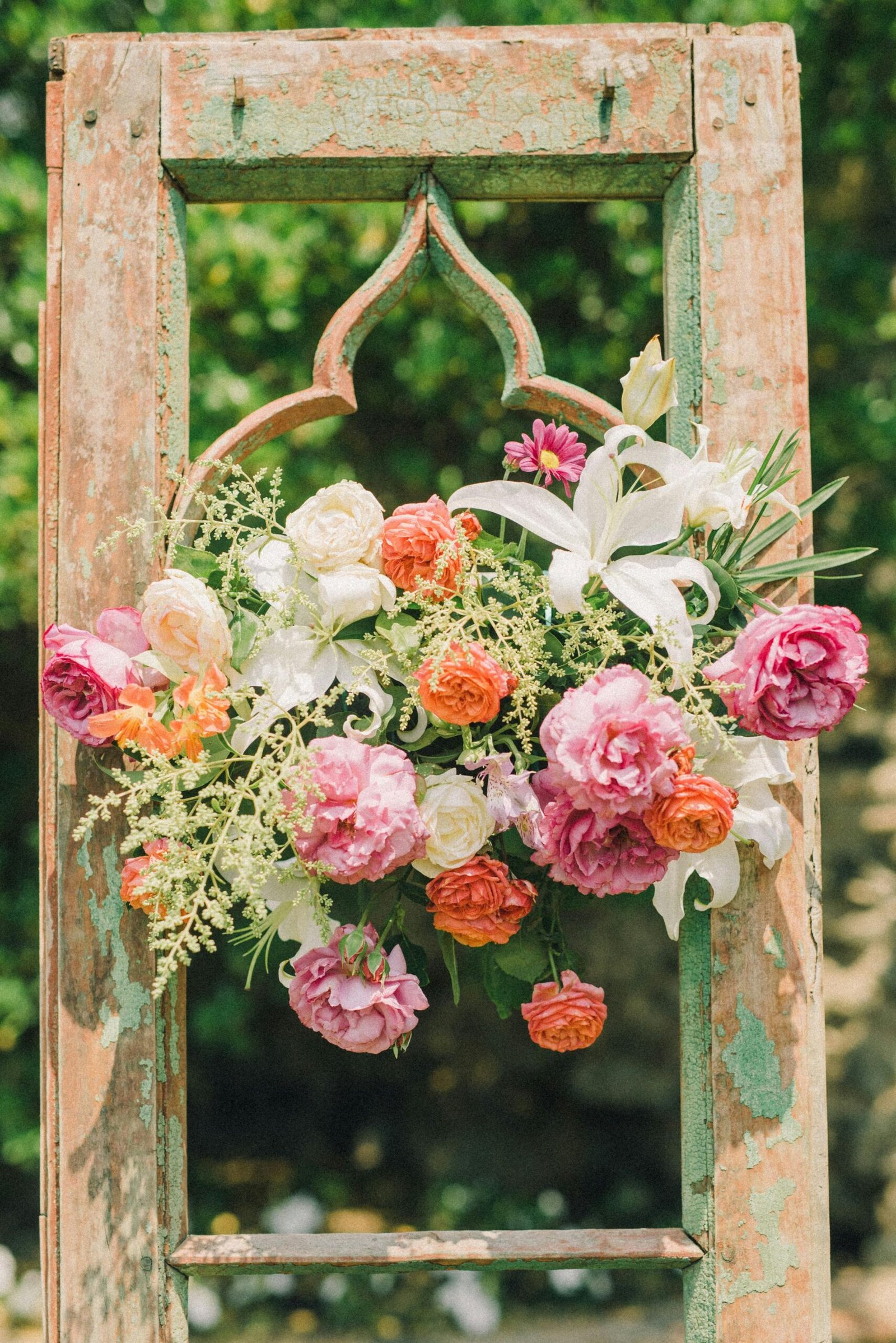 A rustic frame decorated with flowers